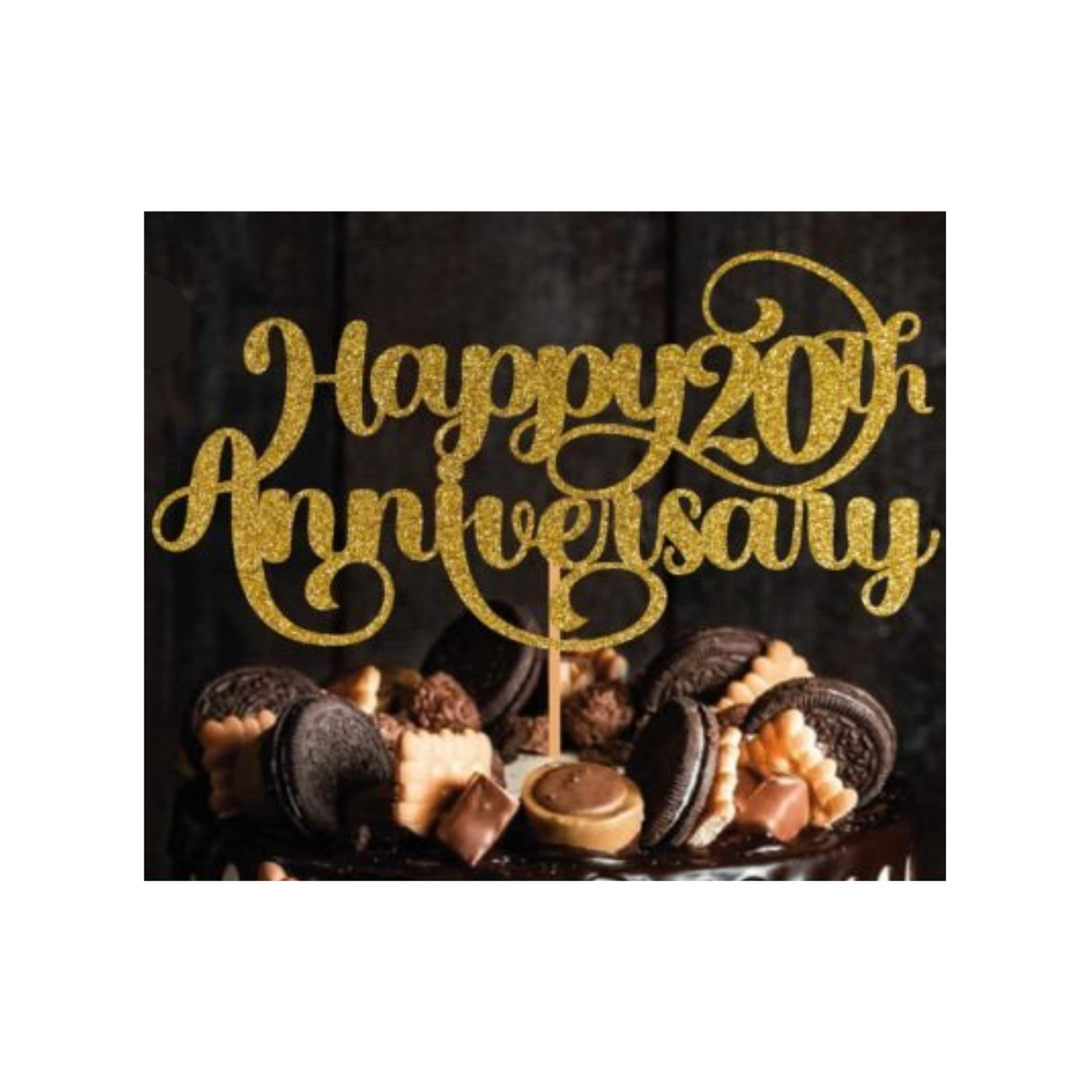 Cake topper with the words: Happy 20th Anniversary in glitter against a dark background inserted into a cake. Cake topper can be made in different colours.