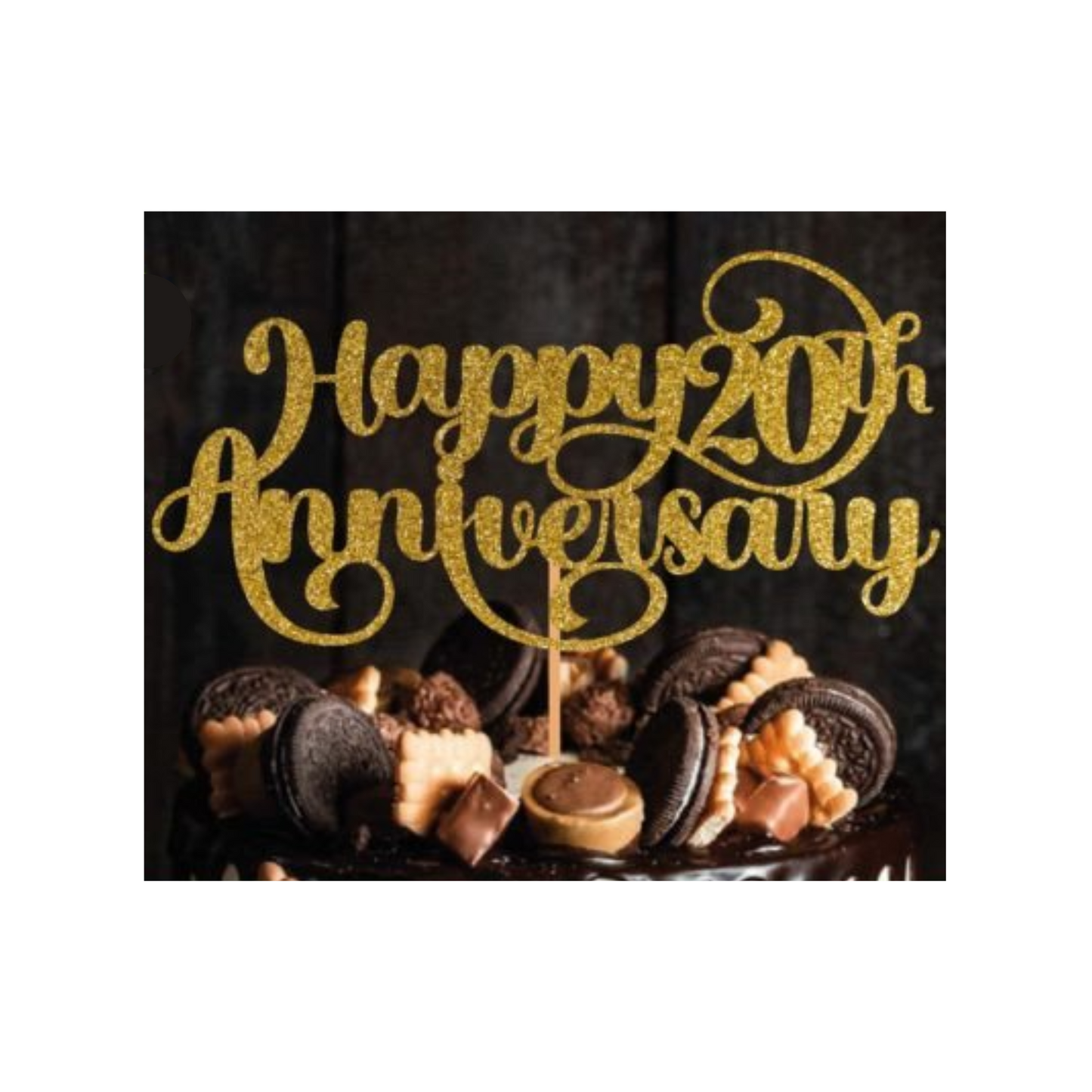 Cake topper with the words: Happy 20th Anniversary in glitter against a dark background inserted into a cake. Cake topper can be made in different colours. 